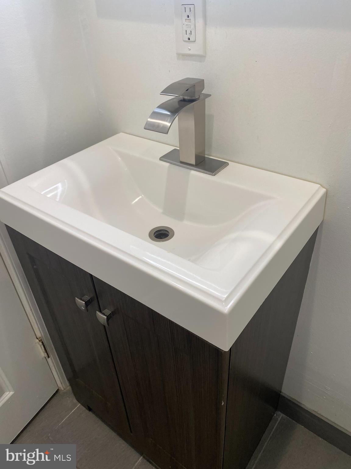 1122 Penn Street Northeast, Unit 1 Washington, DC 20002 - Photo 19 of 31 a close up of a sink