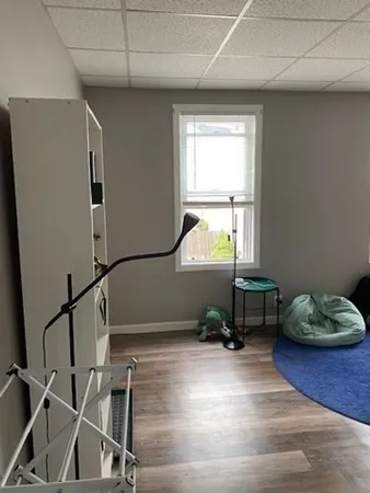 a view of workspace with wooden floor