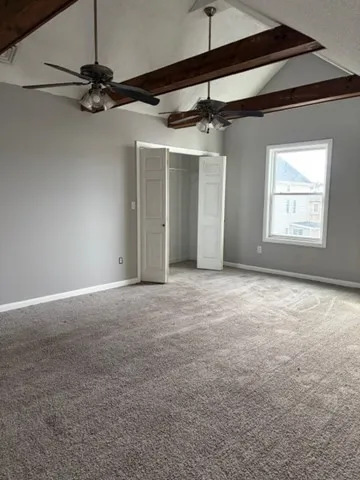a kitchen with a stove and a refrigerator