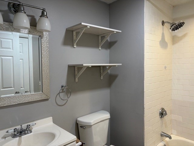 207 Rodman Street Fall River, MA 02721 - Photo 34 of 36 a bathroom with a toilet sink and shower