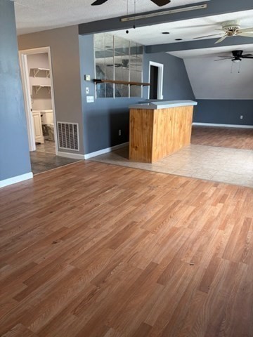 207 Rodman Street Fall River, MA 02721 - Photo 35 of 36 a view of a kitchen with wooden floor