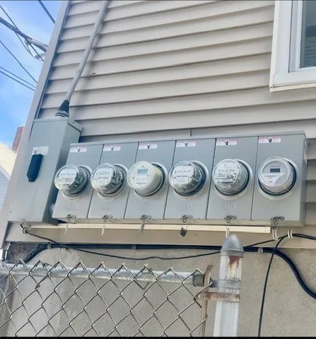 an aerial view of a fireplace with wooden floor