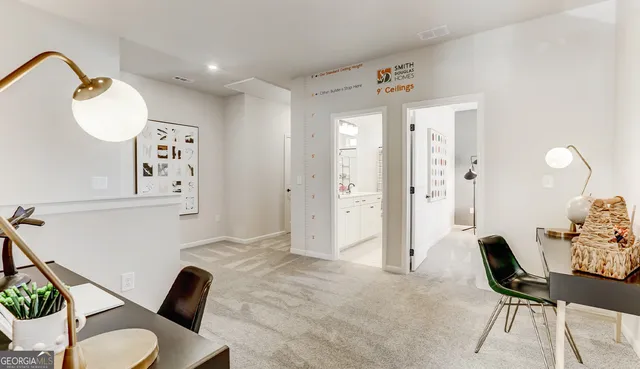 a view of a livingroom with furniture and a chair