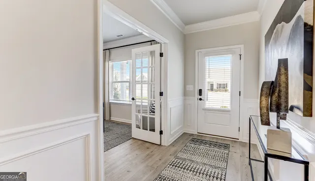 a view of an entryway with livingroom