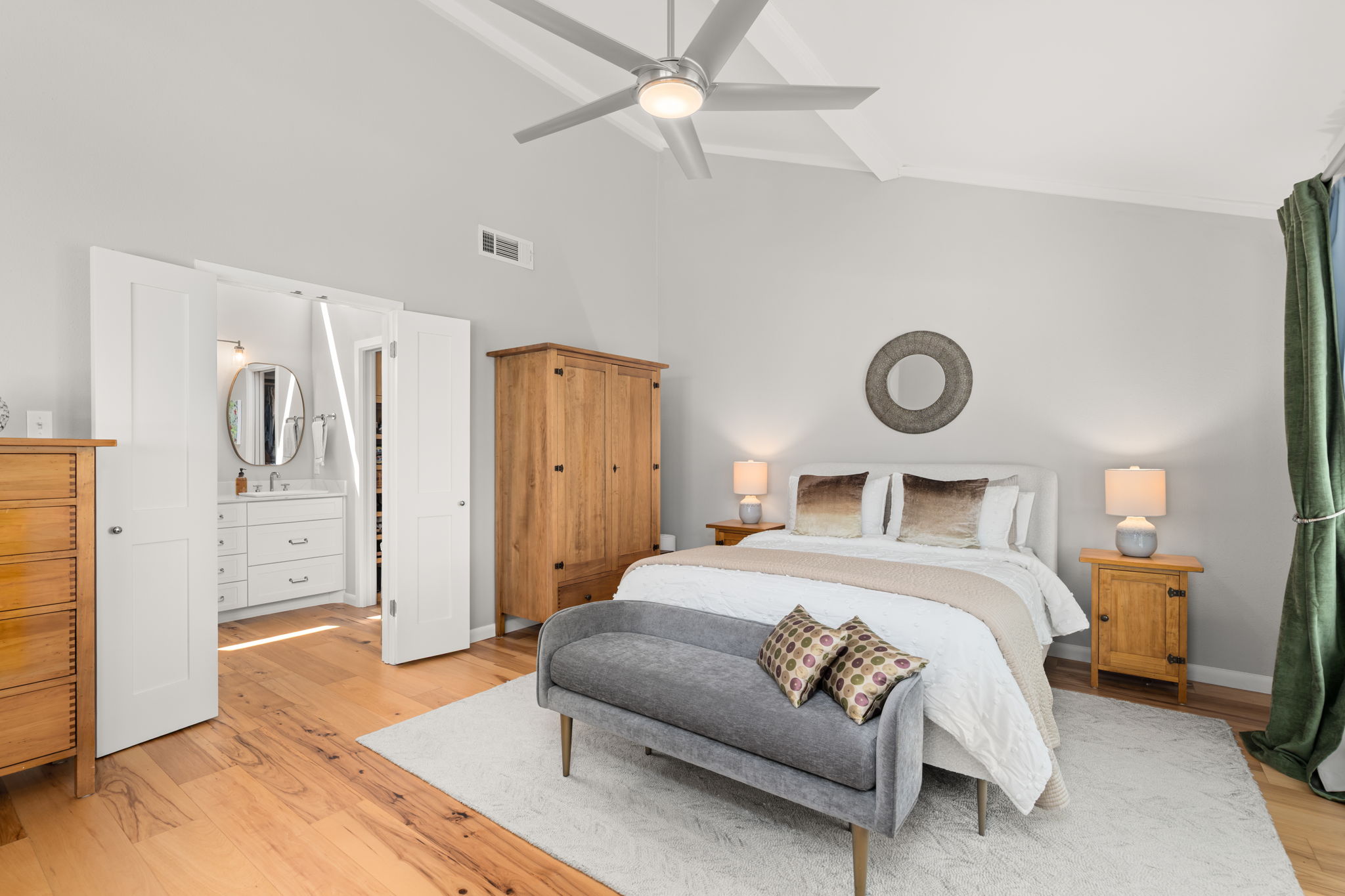 2310 Camino Alto Road Austin, TX 78746 - Photo 17 of 29 a bedroom with a bed and a refrigerator