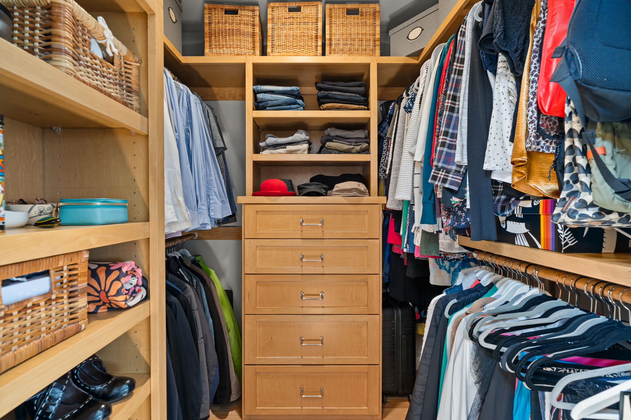 2310 Camino Alto Road Austin, TX 78746 - Photo 20 of 29 a view of walk in closet with clothes and shoes