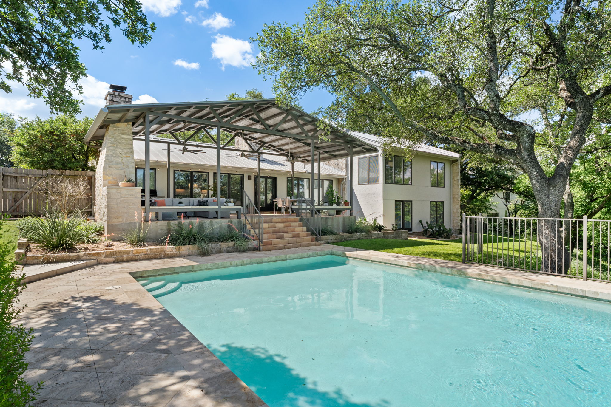 2310 Camino Alto Road Austin, TX 78746 - Photo 29 of 29 a view of a house with swimming pool and a yard