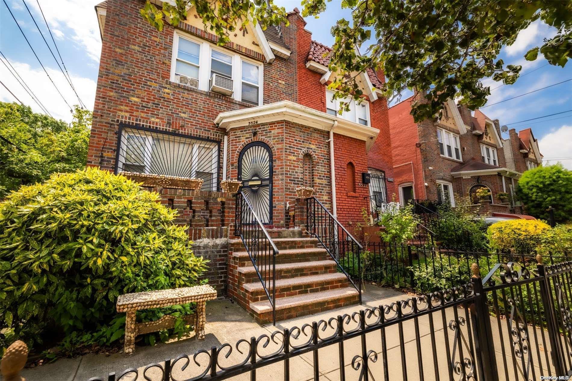 3524 Ave. M Brooklyn, NY 11234 - Photo 5 of 12 a front view of a house with a garden