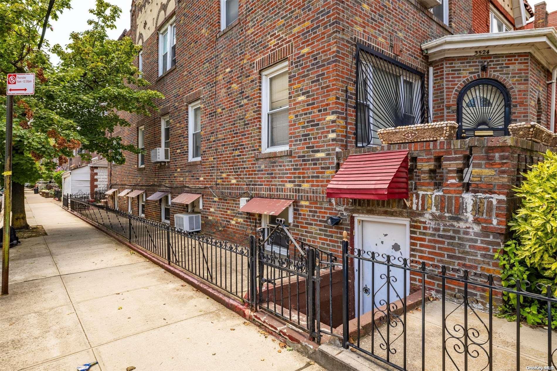 3524 Ave. M Brooklyn, NY 11234 - Photo 8 of 12 a view of a brick house with iron fence