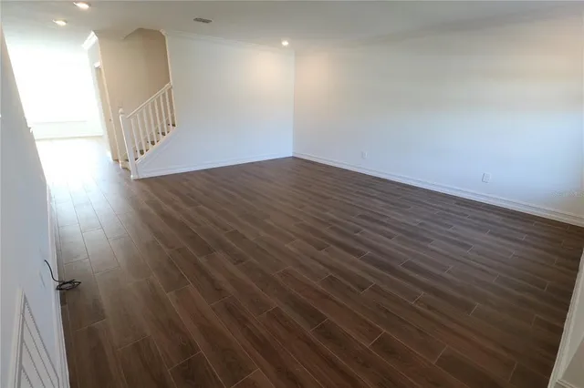 an entryway in a hall with a window