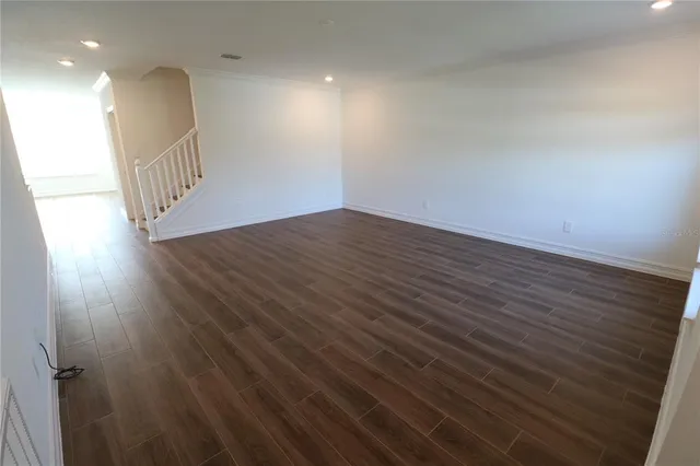 a view of a bathroom with toilet and a shower