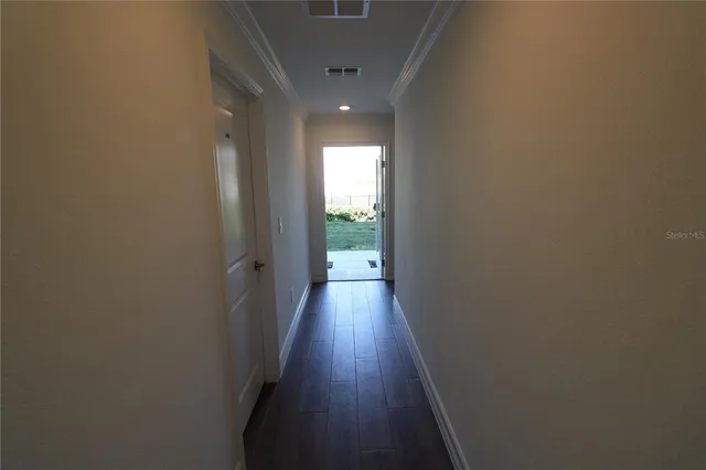 a bathroom with a glass door shower