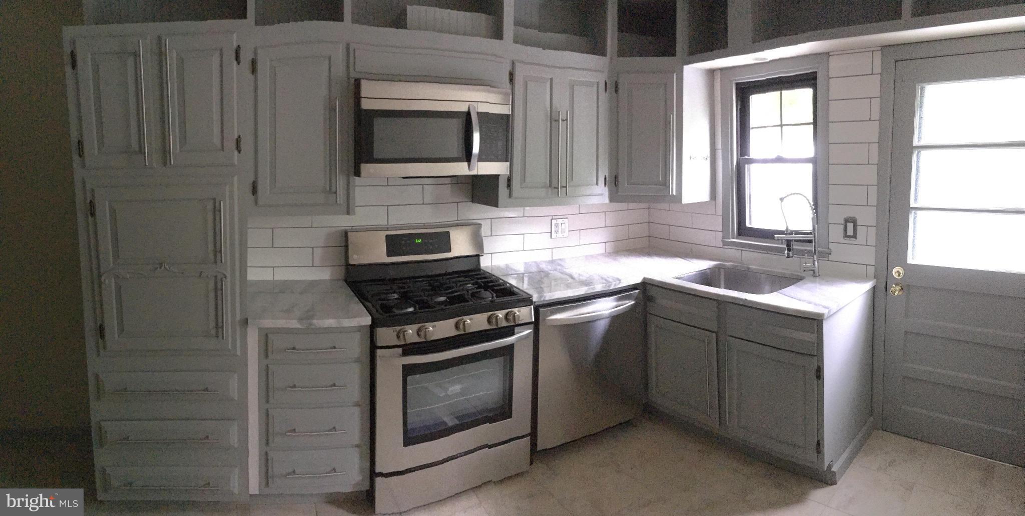 1301 Glenmont Road Baltimore, MD 21239 - Photo 14 of 30 Kitchen