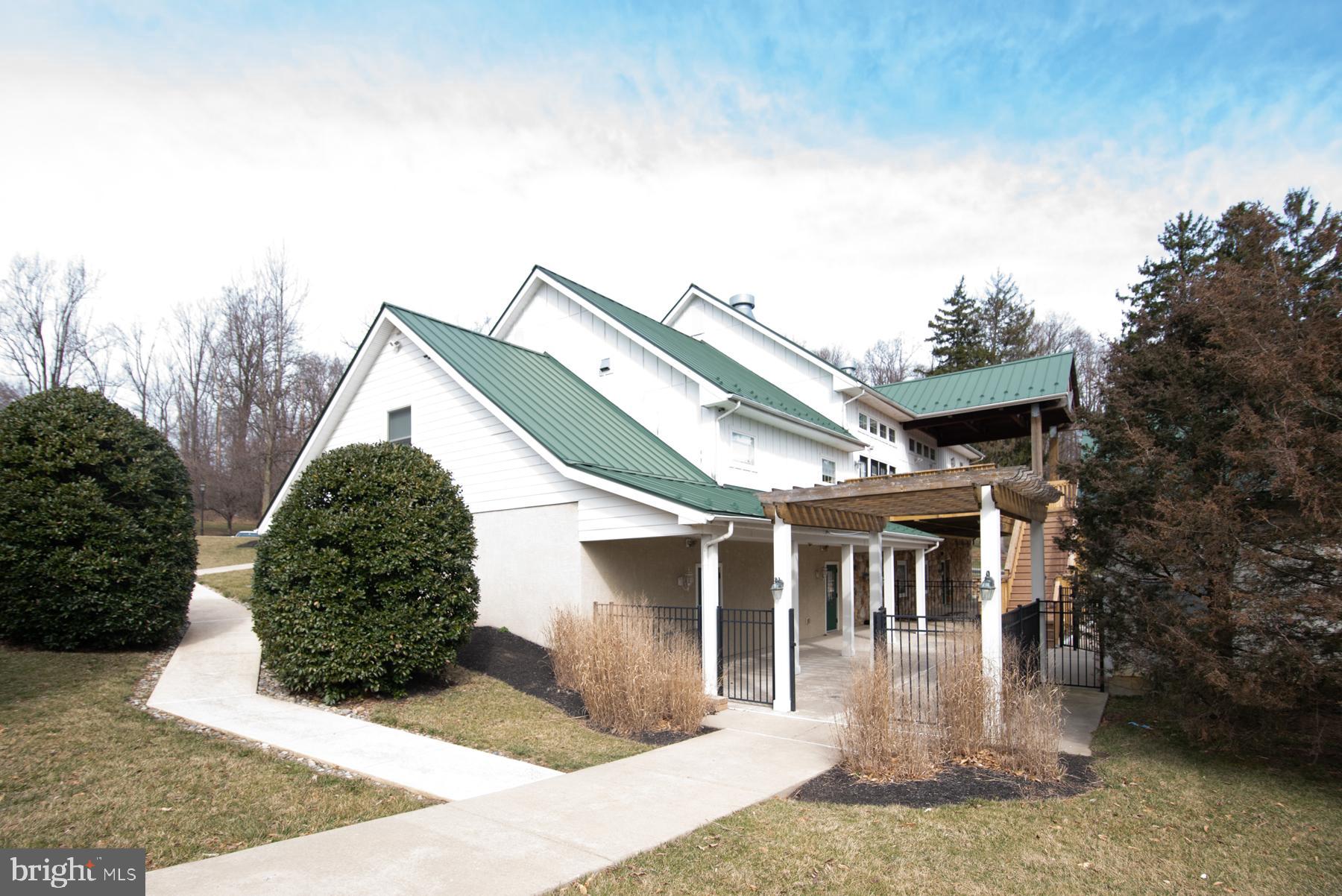 257 Flagstone Road, Unit 4 Chester Springs, PA 19425 - Photo 47 of 55 Clubhouse with In-ground Pool