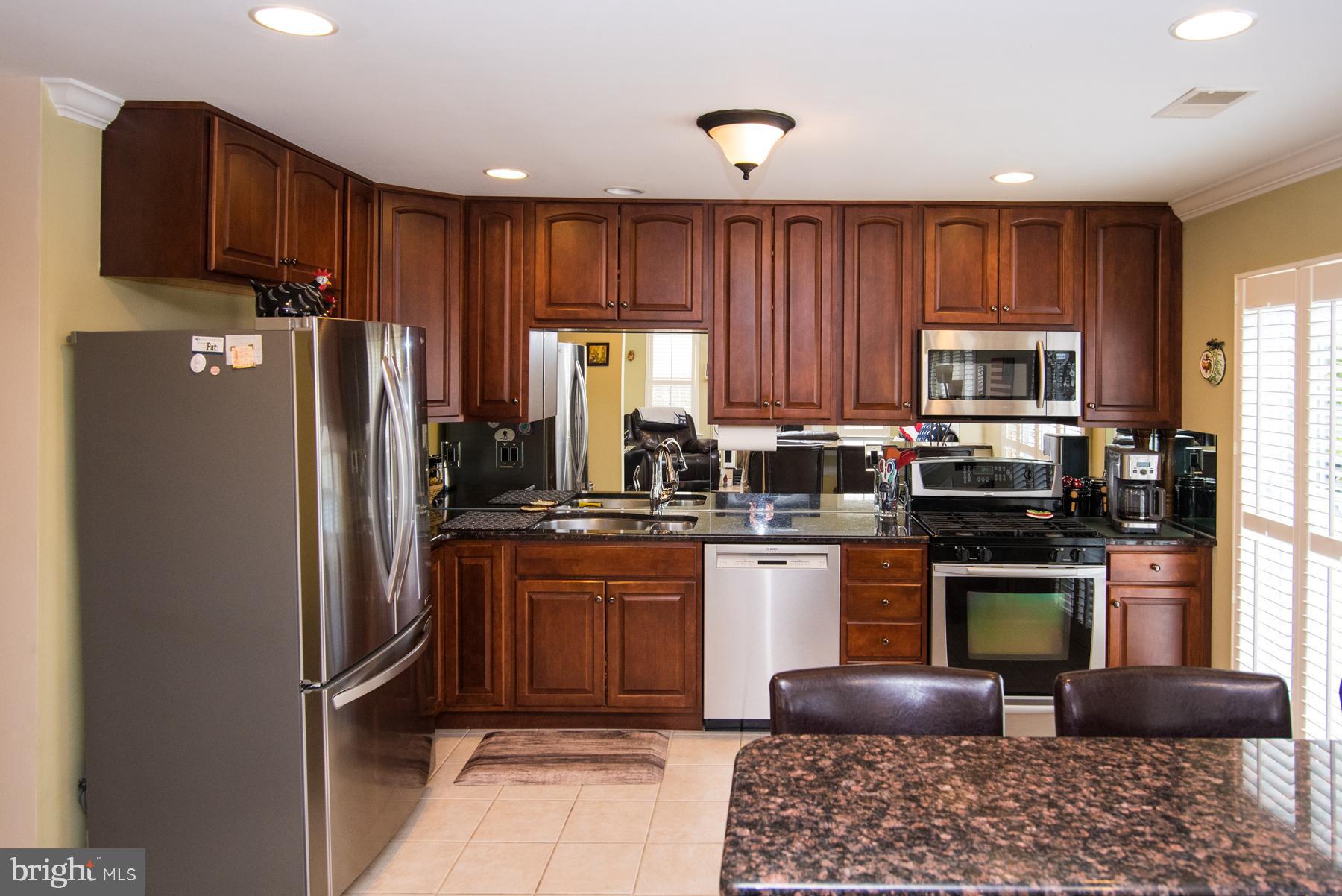 257 Flagstone Road, Unit 4 Chester Springs, PA 19425 - Photo 9 of 55 Kitchen w/ granite counters and s/s appliances