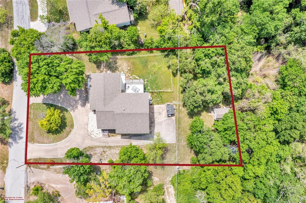 110 Vanshire Road West Lakeside, TX 76108 - Photo 3 of 34 an aerial view of a house with garden space and outdoor space