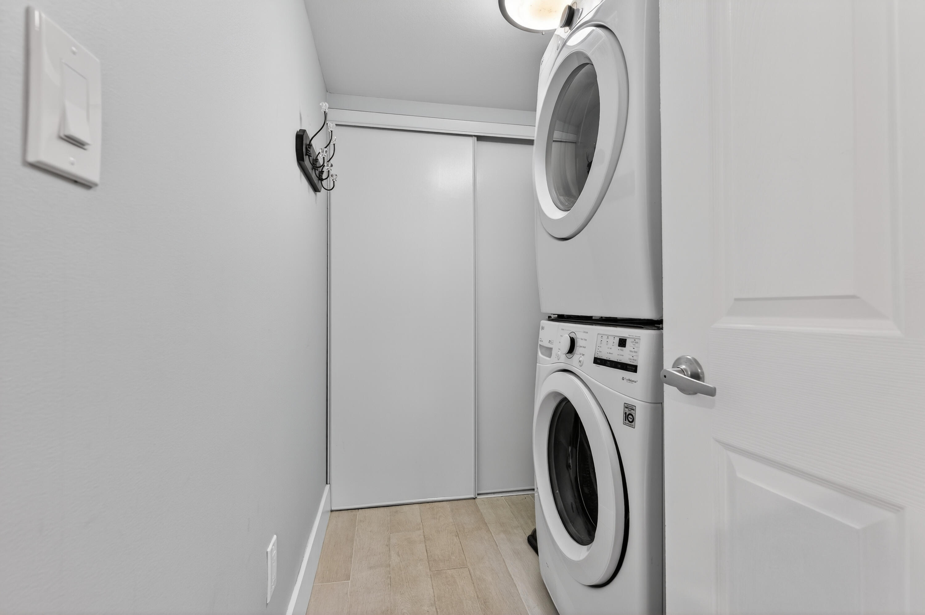 7142 South Devon Drive, Unit 210 Tamarac, FL 33321 - Photo 29 of 36 a utility room with dryer and washer