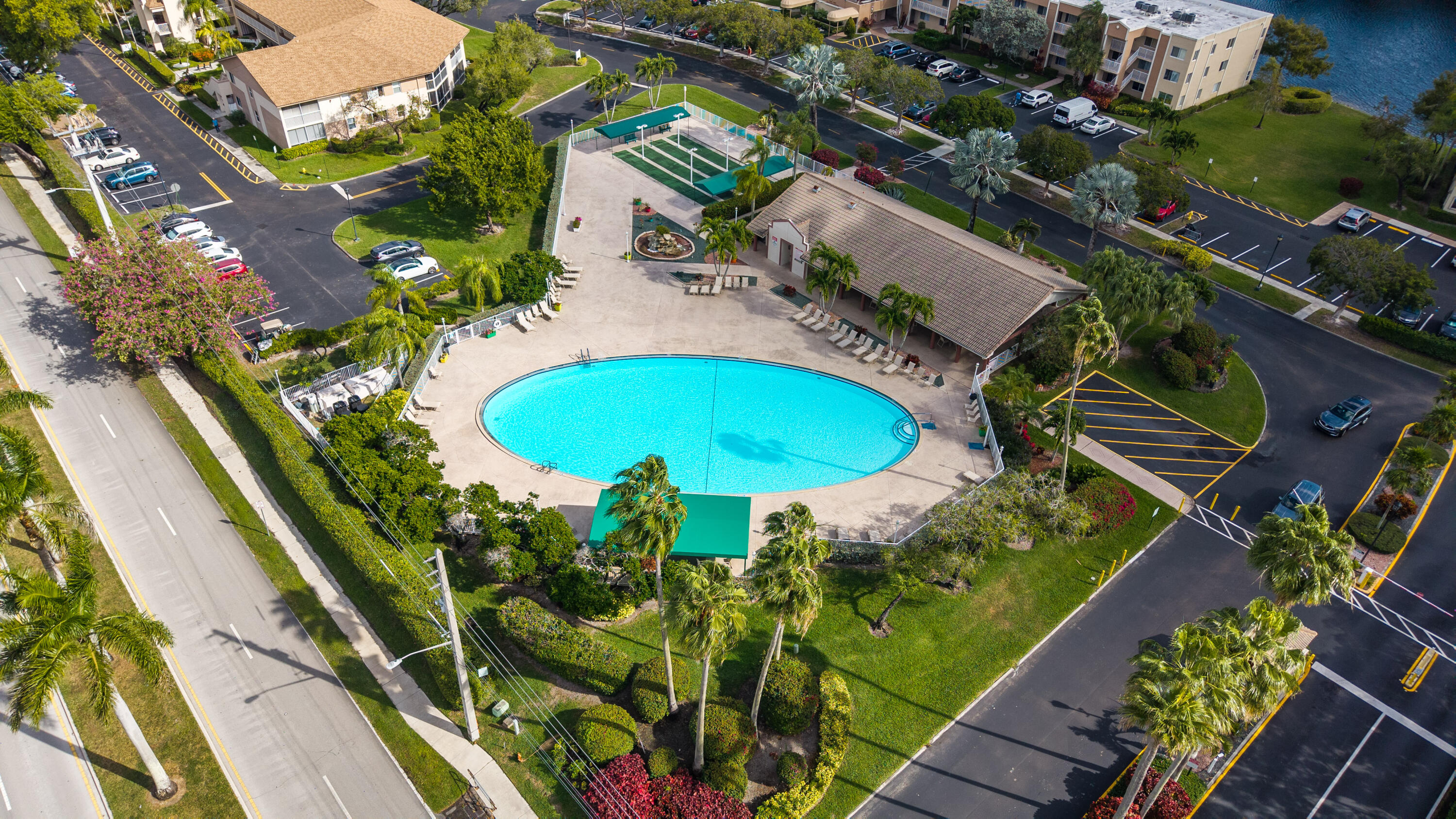 7142 South Devon Drive, Unit 210 Tamarac, FL 33321 - Photo 36 of 36 an aerial view of a house with a swimming pool