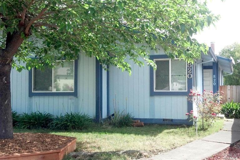 820-824 Middle Rincon Road Santa Rosa, CA 95409 - Photo 1 of 1 a front view of a house with garden