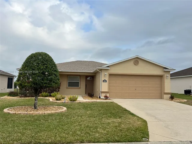 a front view of house with yard