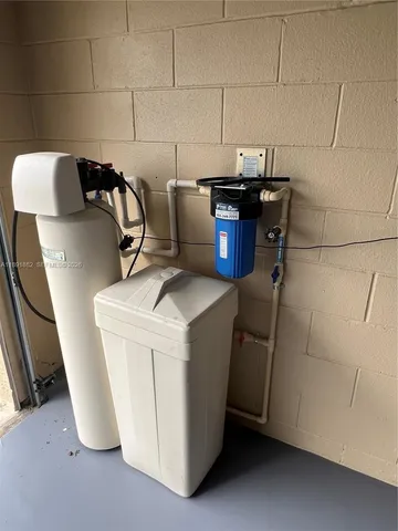 a view of storage and utility room with washer and dryer
