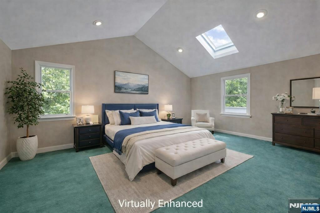 44 West Midland Avenue Paramus, NJ 07652 - Photo 16 of 19 a bedroom with a bed painting on wall and windows