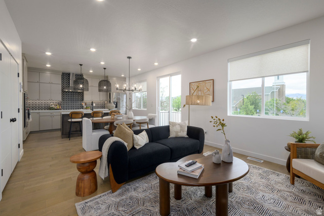 267 Fushion Lane Draper, UT 84020 - Photo 7 of 26 Comfortable gathering space with an inviting atmosphere. *model home photo