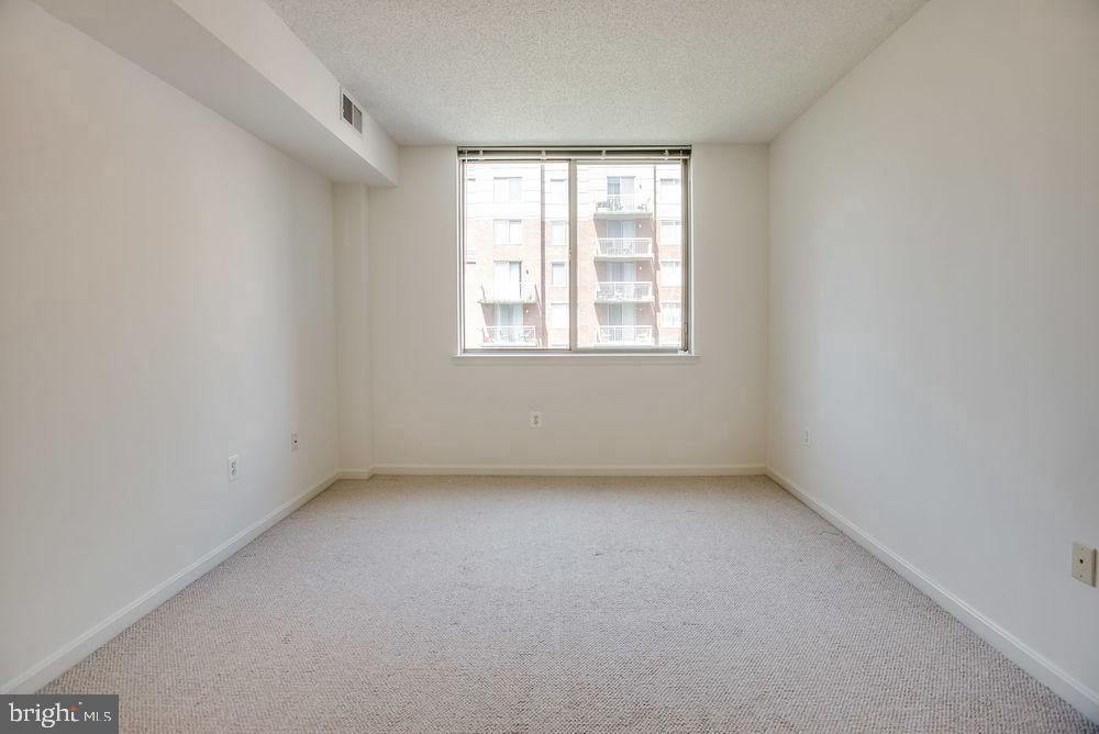 3830 9th Street North, Unit 607E Arlington, VA 22203 - Photo 7 of 17 an empty room with a window
