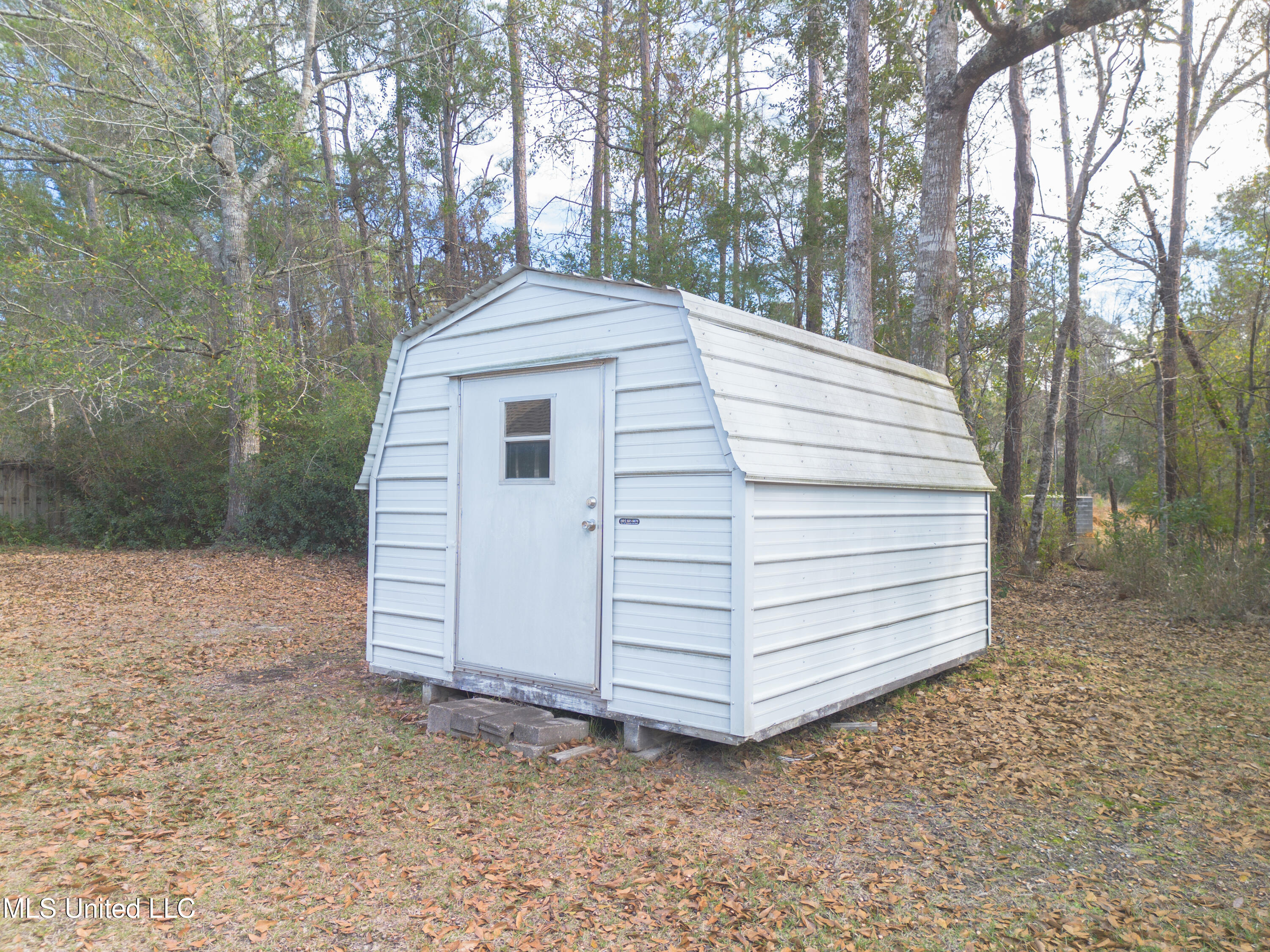 7322 Analii Street Diamondhead, MS 39525 - Photo 25 of 27 Storage Shed