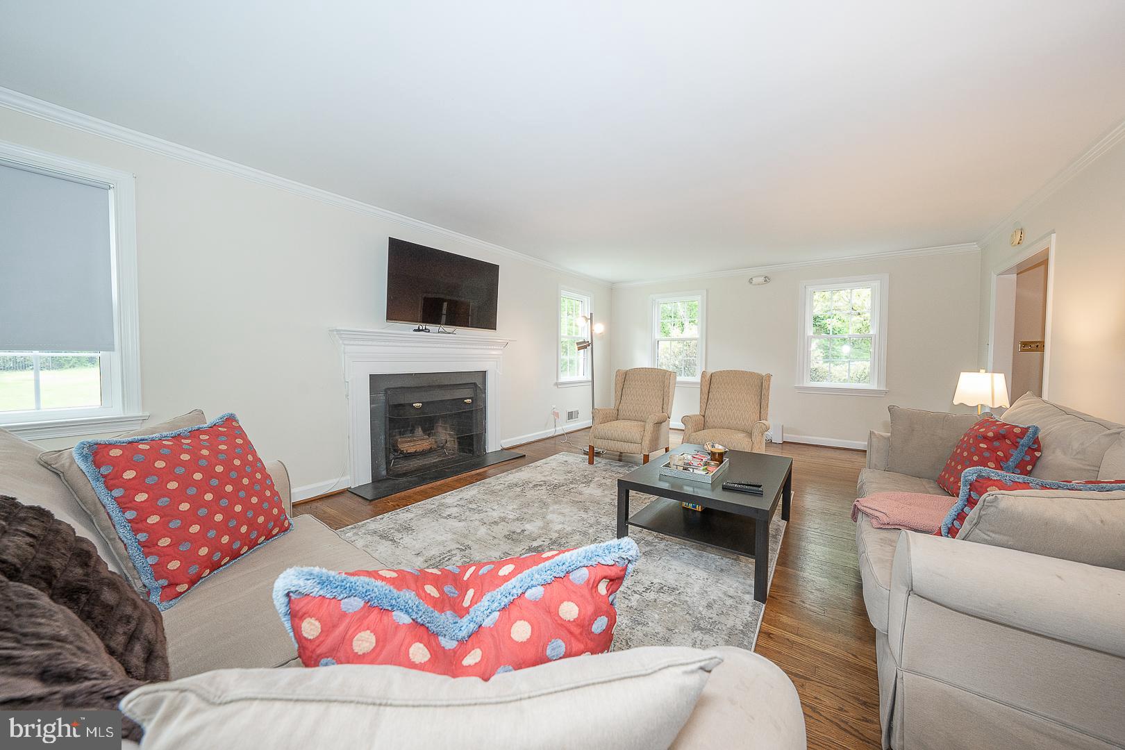 538 Conestoga Road Villanova, PA 19085 - Photo 5 of 39 a living room with furniture and a fireplace