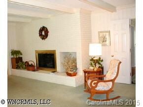401 Brandon Road Hendersonville, NC 28739 - Photo 3 of 6 a view of living room with furniture and a fireplace