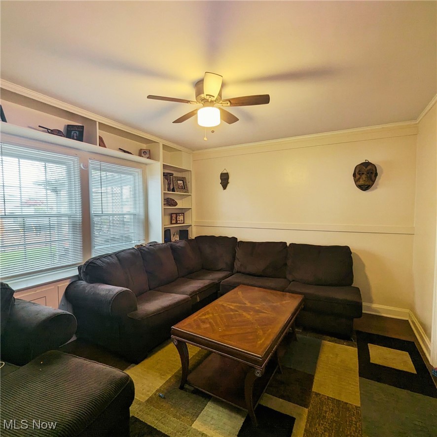 557 Cambridge Road Coshocton, OH 43812 - Photo 10 of 20 Family room with built-in shelving and plenty of entertaining space.