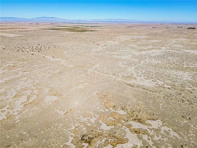a view of beach and an ocean