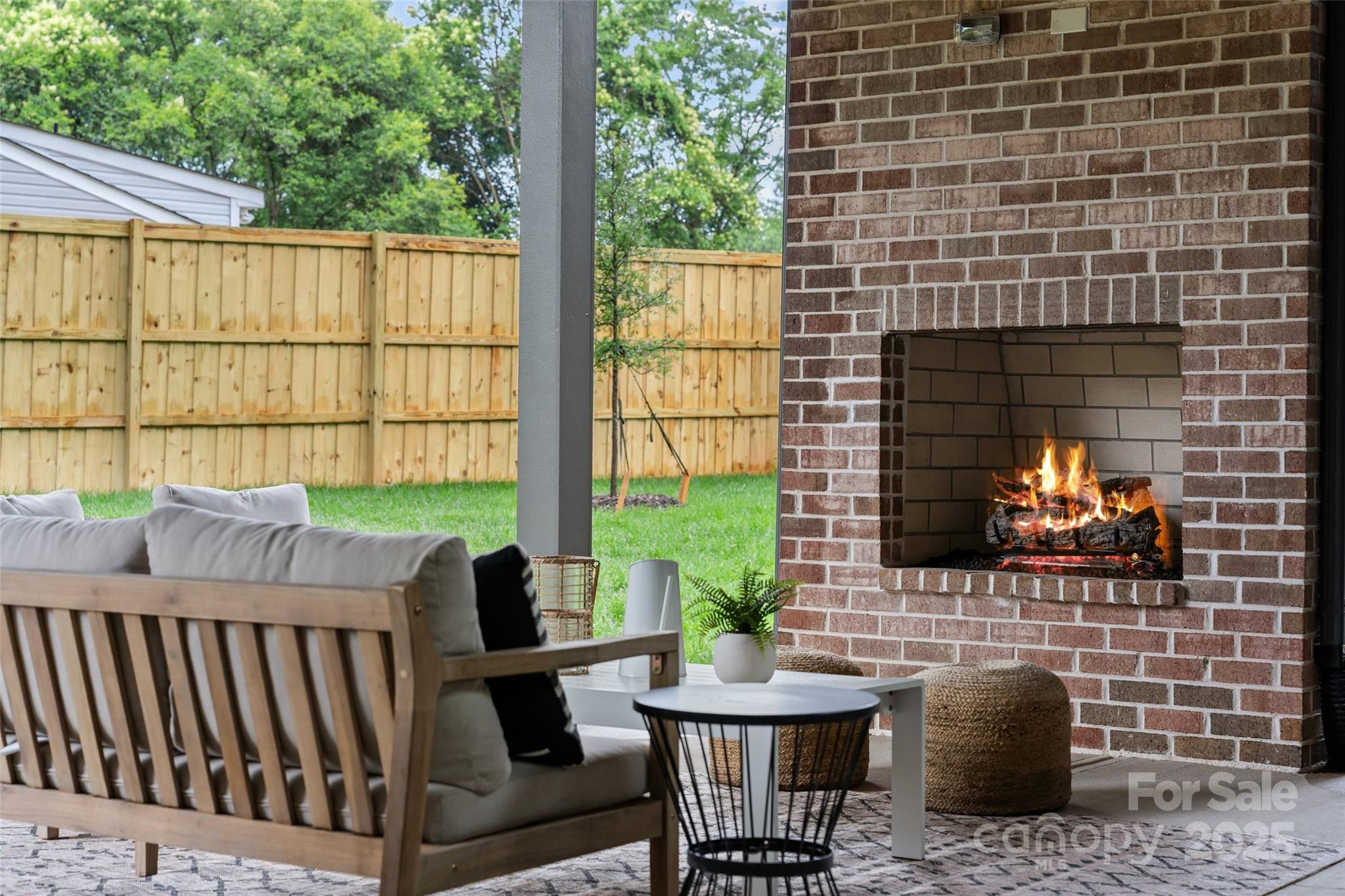 3822 Topsfield Road Charlotte, NC 28211 - Photo 12 of 43 a view of a porch with furniture and a fire pit