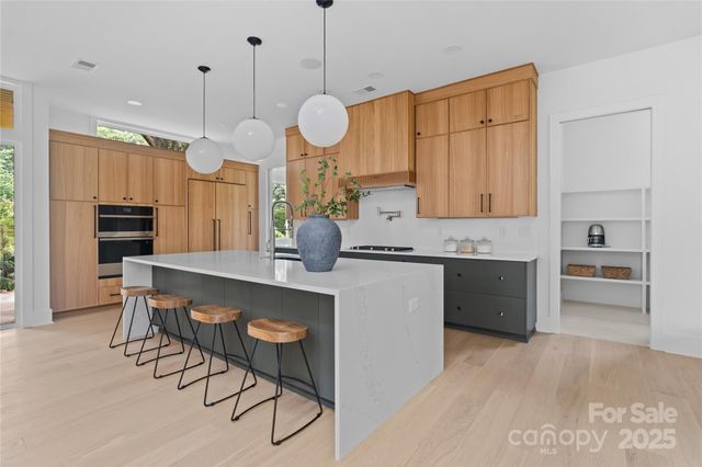 a large kitchen with cabinets