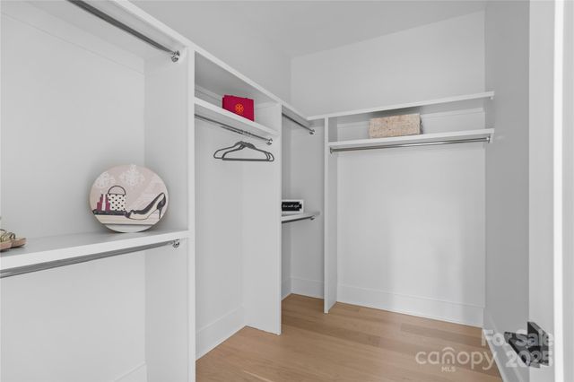 a room with a white cabinet