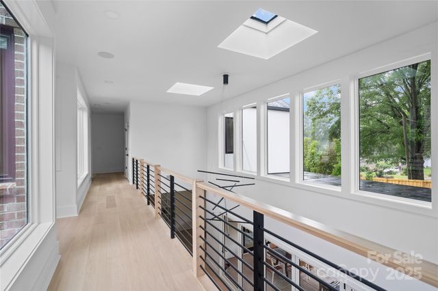 a view of a kitchen with windows