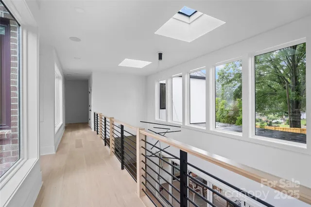 a view of a kitchen with windows
