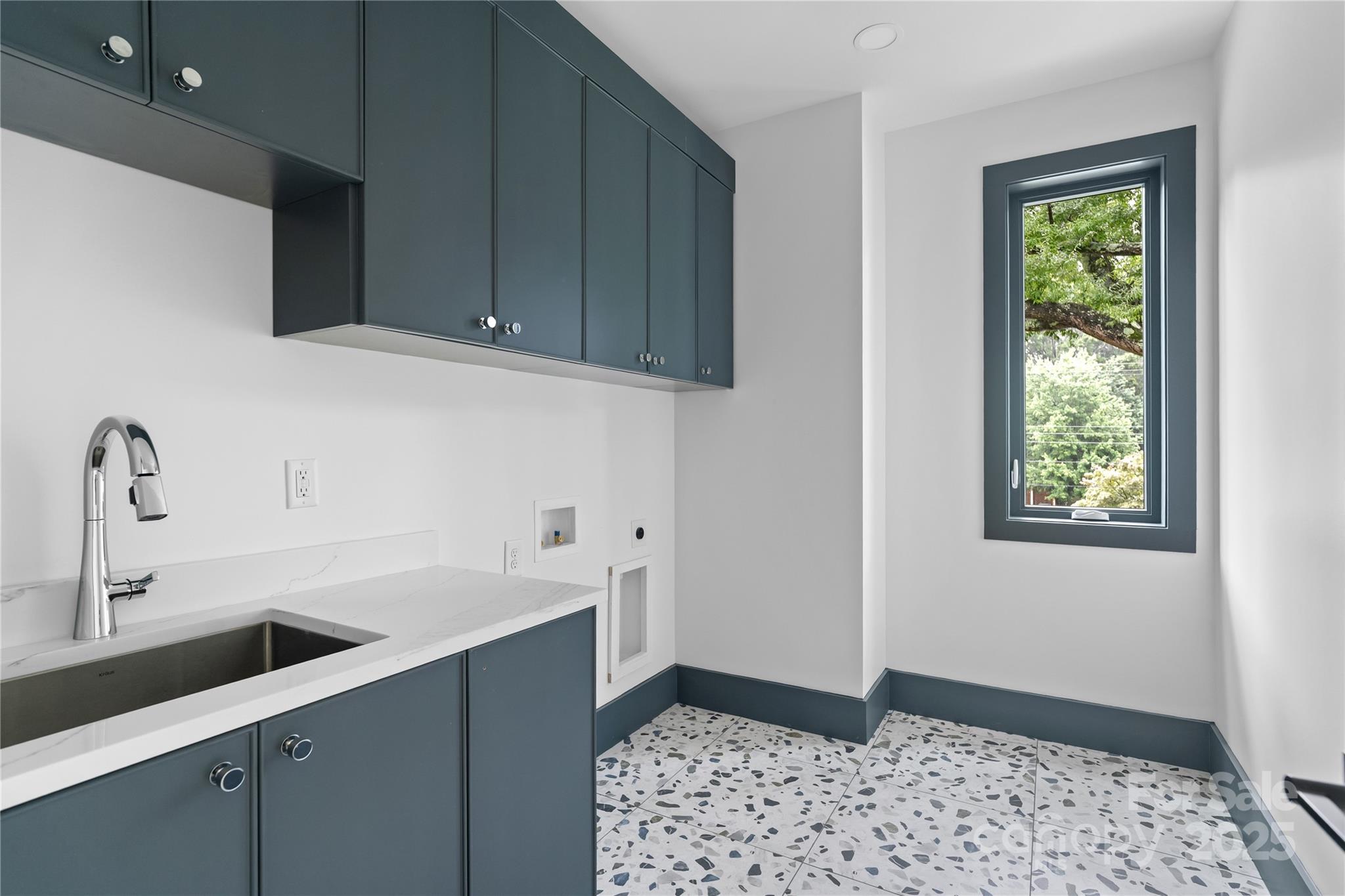 3822 Topsfield Road Charlotte, NC 28211 - Photo 29 of 43 a kitchen with a sink and cabinets