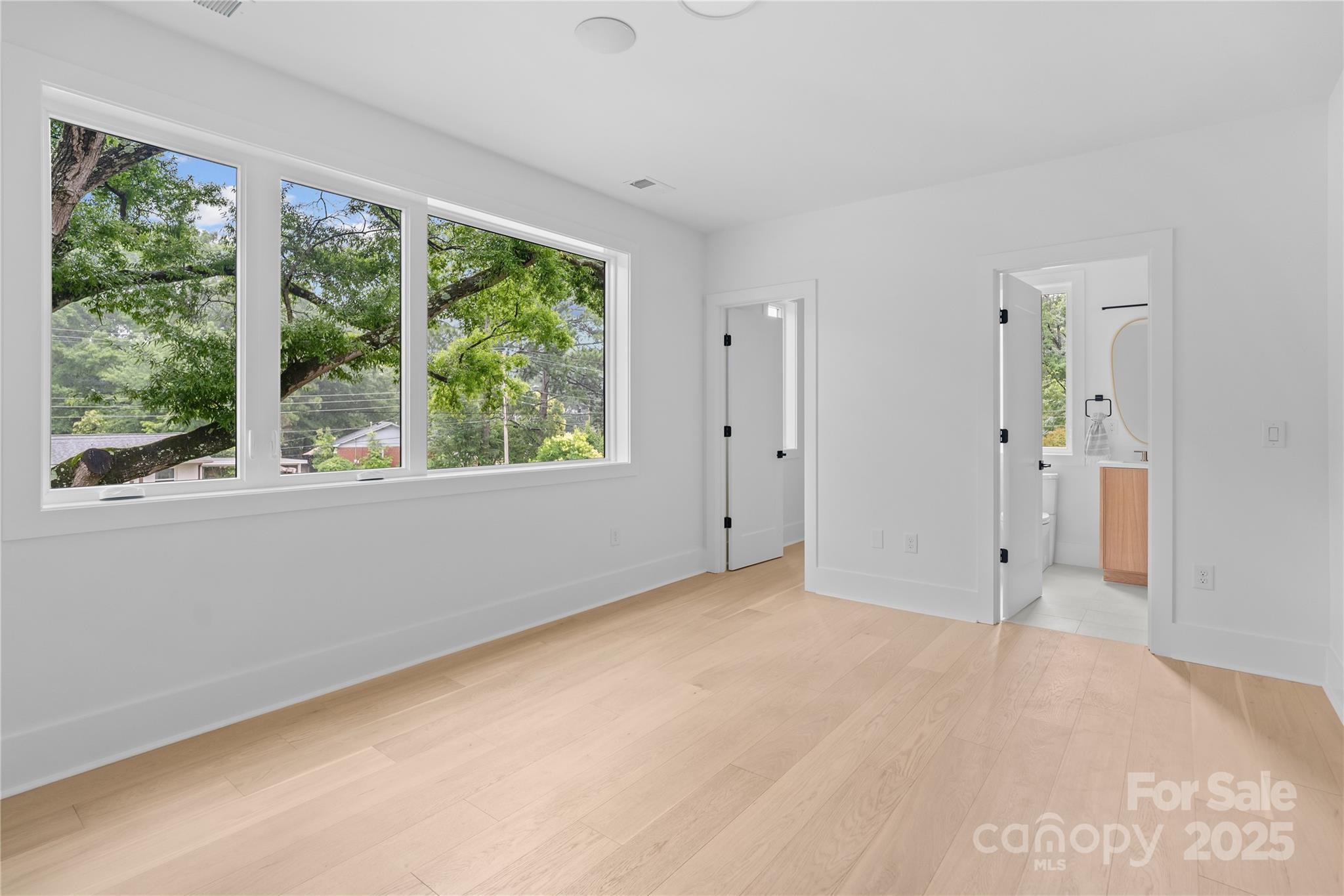 3822 Topsfield Road Charlotte, NC 28211 - Photo 30 of 43 a view of an empty room with a window