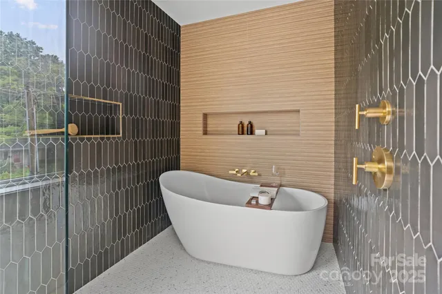 a view of a bathtub in a bathroom