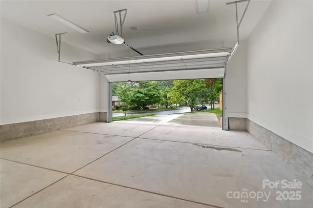 a view of empty room with floor to ceiling window