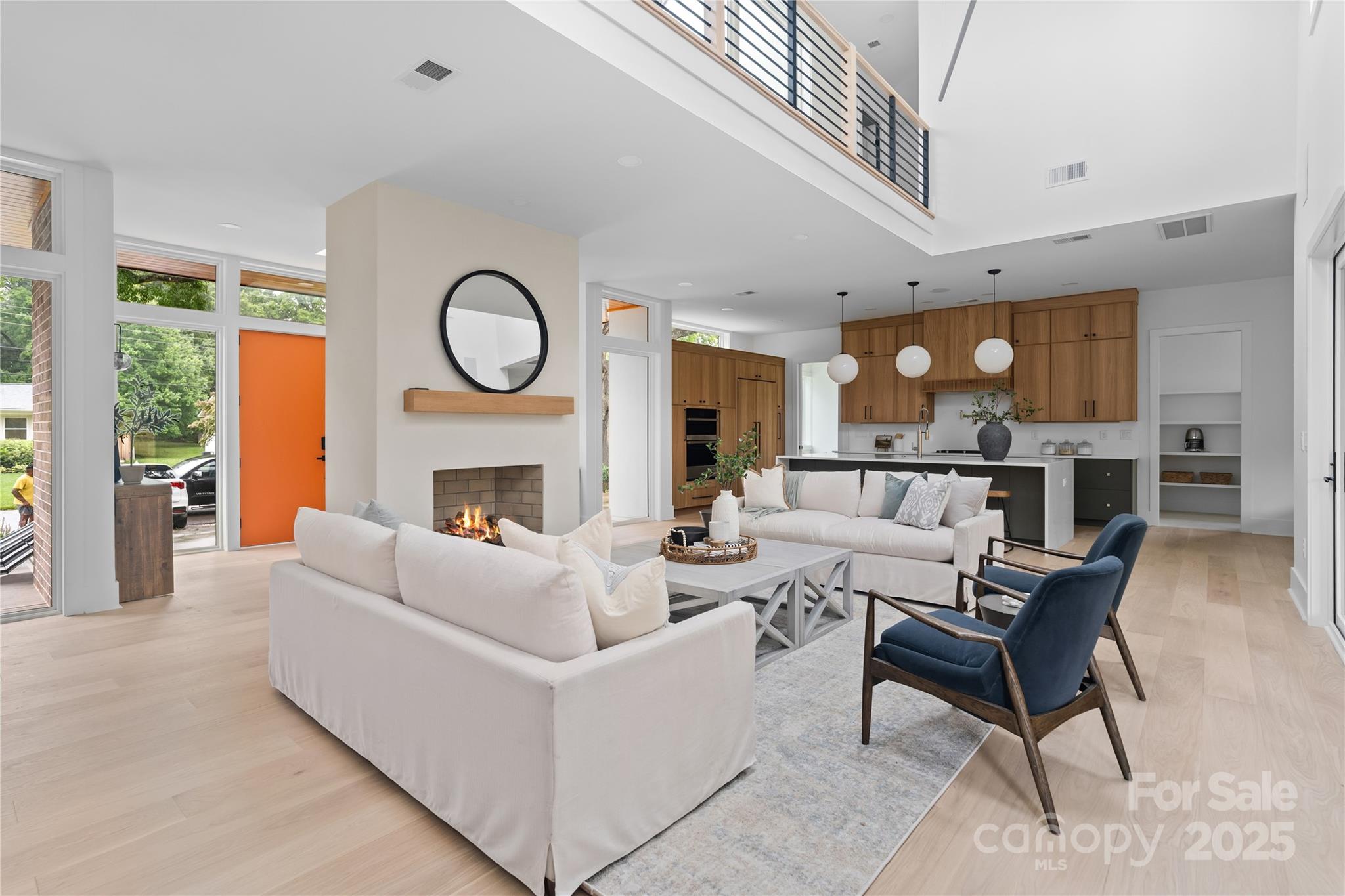 3822 Topsfield Road Charlotte, NC 28211 - Photo 6 of 43 a living room with furniture a fireplace and a large window