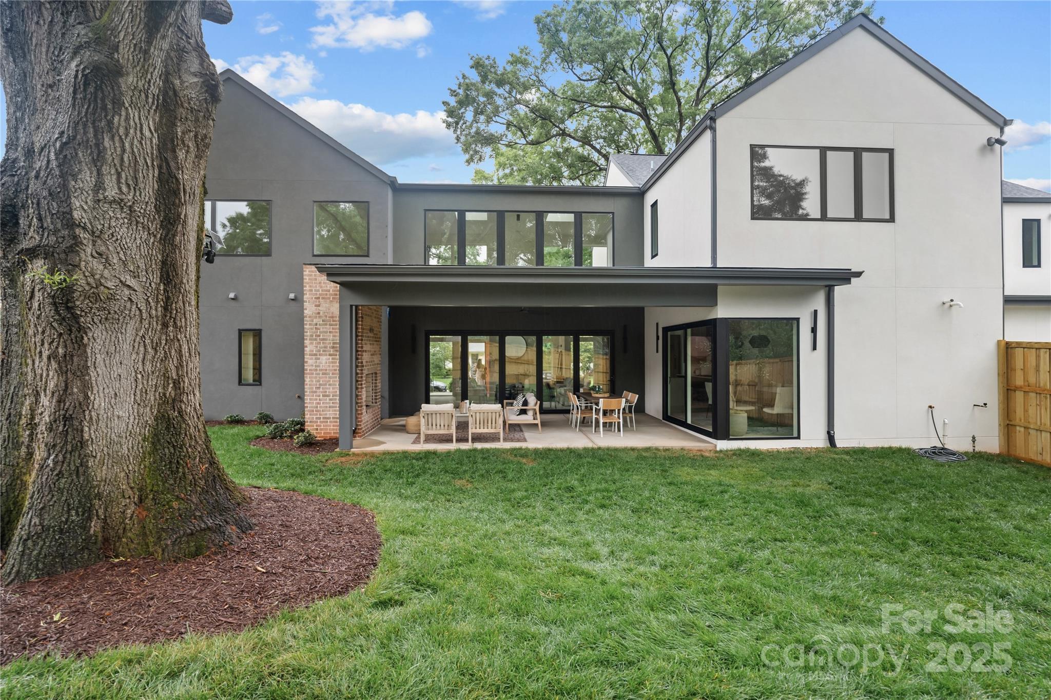 3822 Topsfield Road Charlotte, NC 28211 - Photo 7 of 43 a front view of a house with a yard and porch