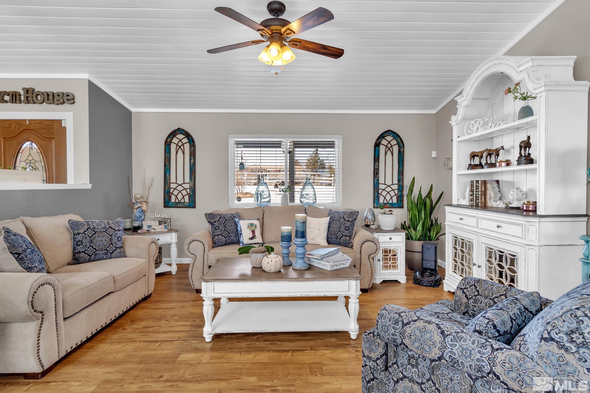 11250 Carlsbad Road Reno, NV 89508 - Photo 8 of 40 a living room with furniture and a large window