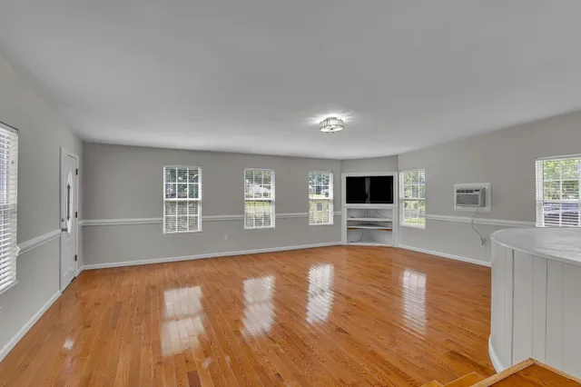 a view of livingroom with hardwood floor and window