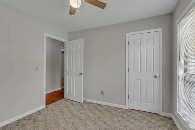 an empty room with windows