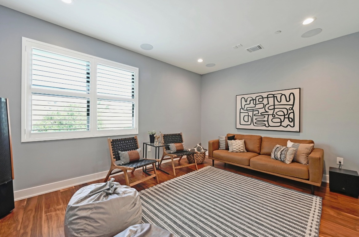 3102 Hunt Trail Austin, TX 78757 - Photo 24 of 38 Living area featuring recessed lighting and wood finished floors