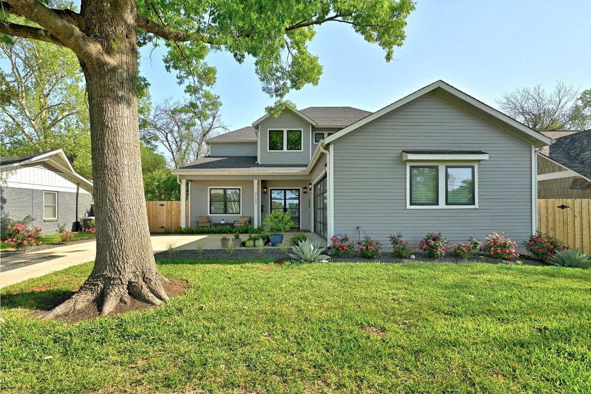 3102 Hunt Trail Austin, TX 78757 - Photo 3 of 38 View of front of property featuring a porch and roof with shingles