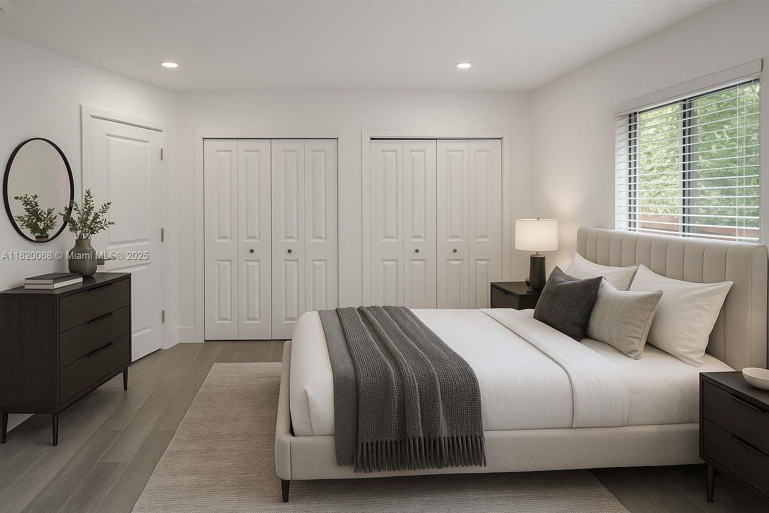 Bayside Miami, FL 33138 - Photo 20 of 44 a bedroom with a bed and a closet